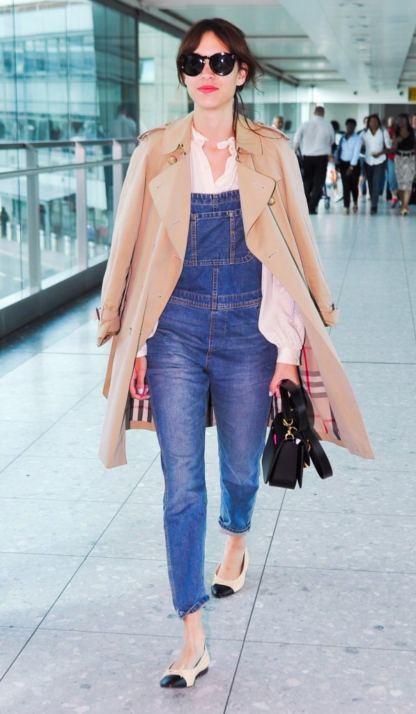 August 30, 2013 Television presenter and model Alexa Chung flies into Heathrow Airport from New York. Alexa is in London to promote her upcoming novel 'It'. The star looked relaxed and casual in cute denim dungarees. Non Exclusive WORLDWIDE RIGHTS Pictures by : FameFlynet UK © 2013 Tel : +44 (0)20 3551 5049 Email : info@fameflynet.uk.com