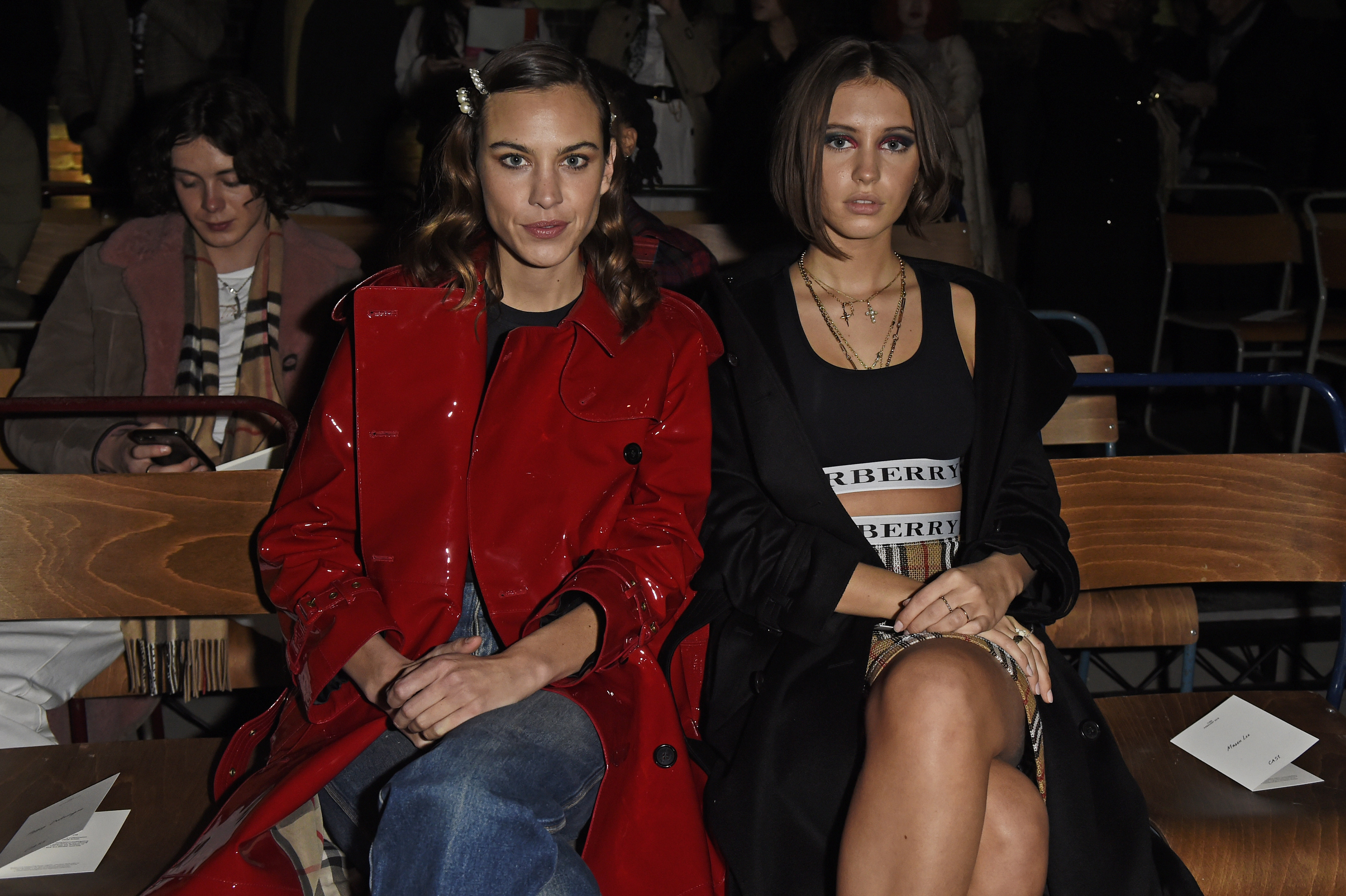 LONDON, ENGLAND - FEBRUARY 17:  Alexa Chung (L) and Iris Law wearing Burberry at the Burberry February 2018 show during London Fashion Week at Dimco Buildings on February 17, 2018 in London, England.   Pic Credit: Dave Benett
